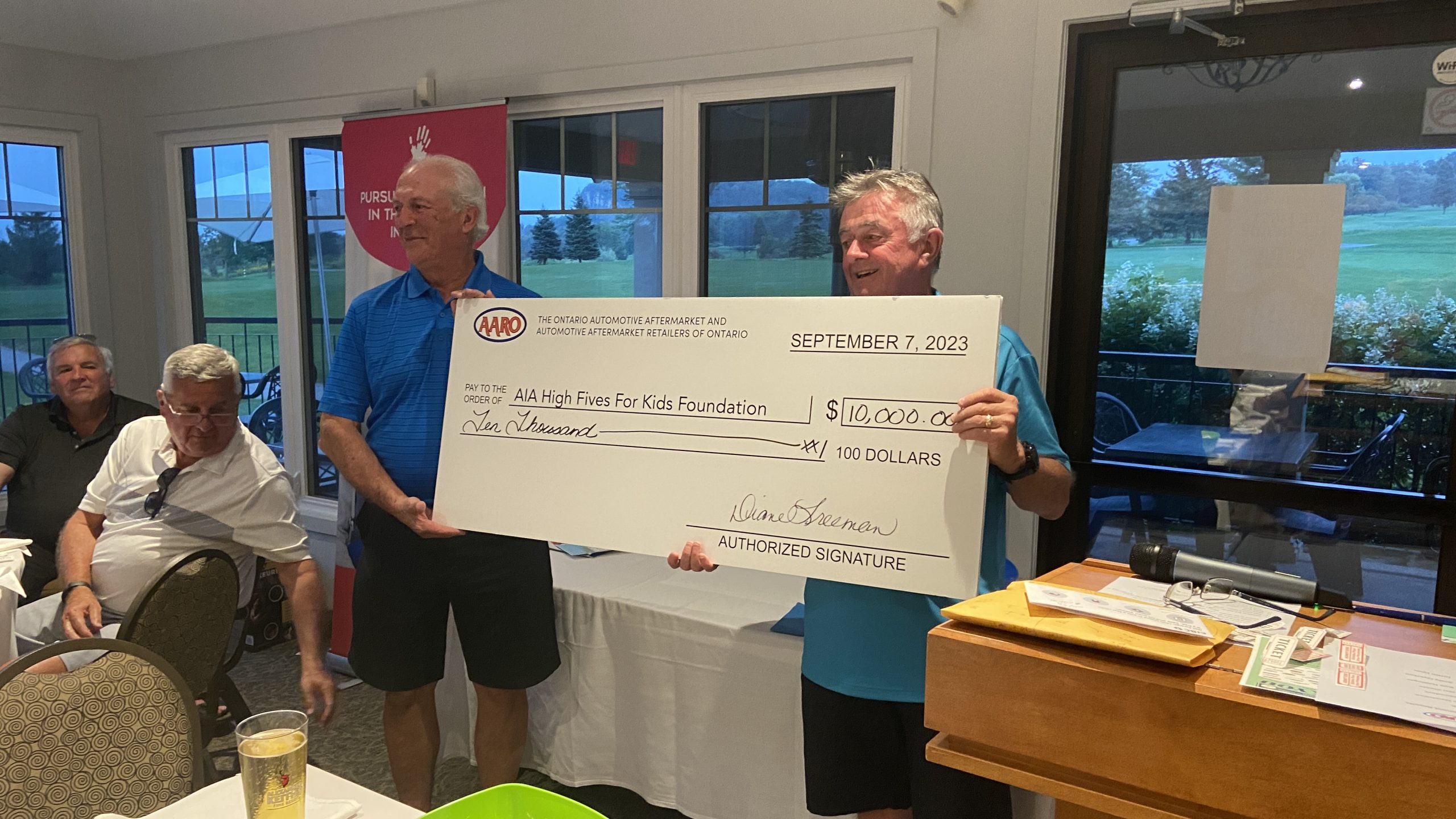 AARO-Golf-Day-2023-Cheque-scaled.jpg