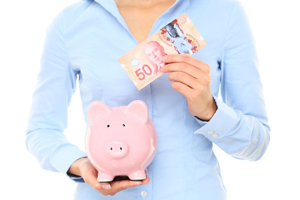 Canadian-Canada-money-saving-piggy-bank-Depositphotos_24537727_S.jpg